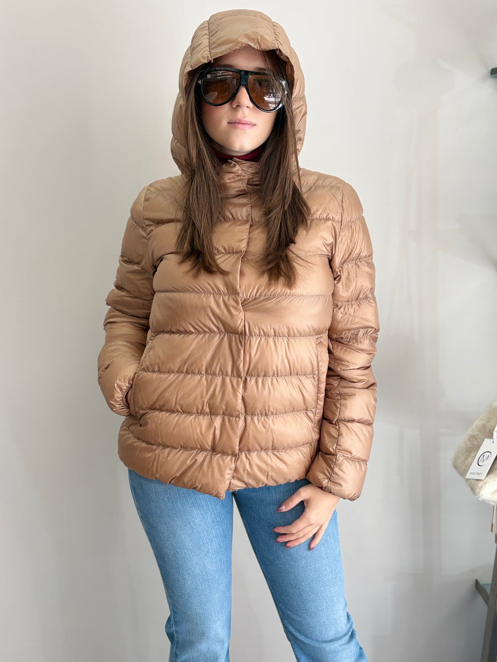 Piumino con cappuccio