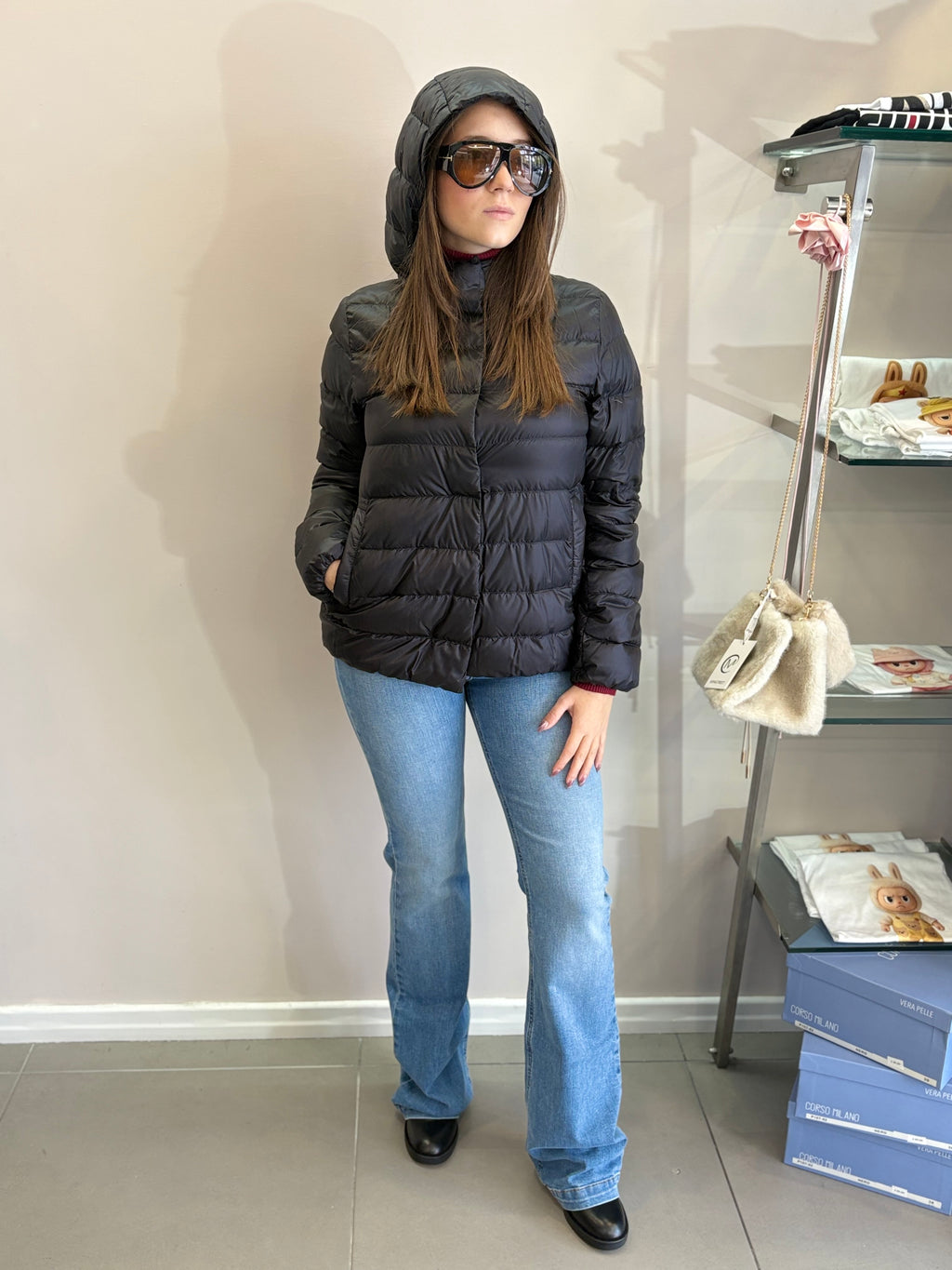 Piumino con cappuccio